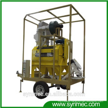 rotary seed cleaner with seed treating unit